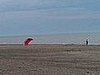 A guy was working on his para-sail skills.